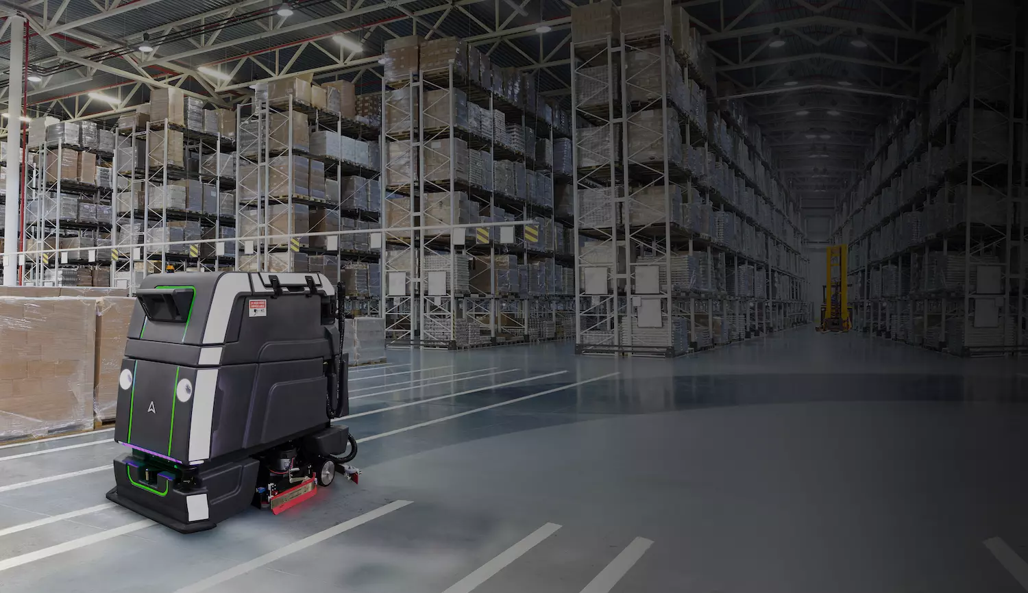 autonomous floor scrubber cleaning large warehouse floor