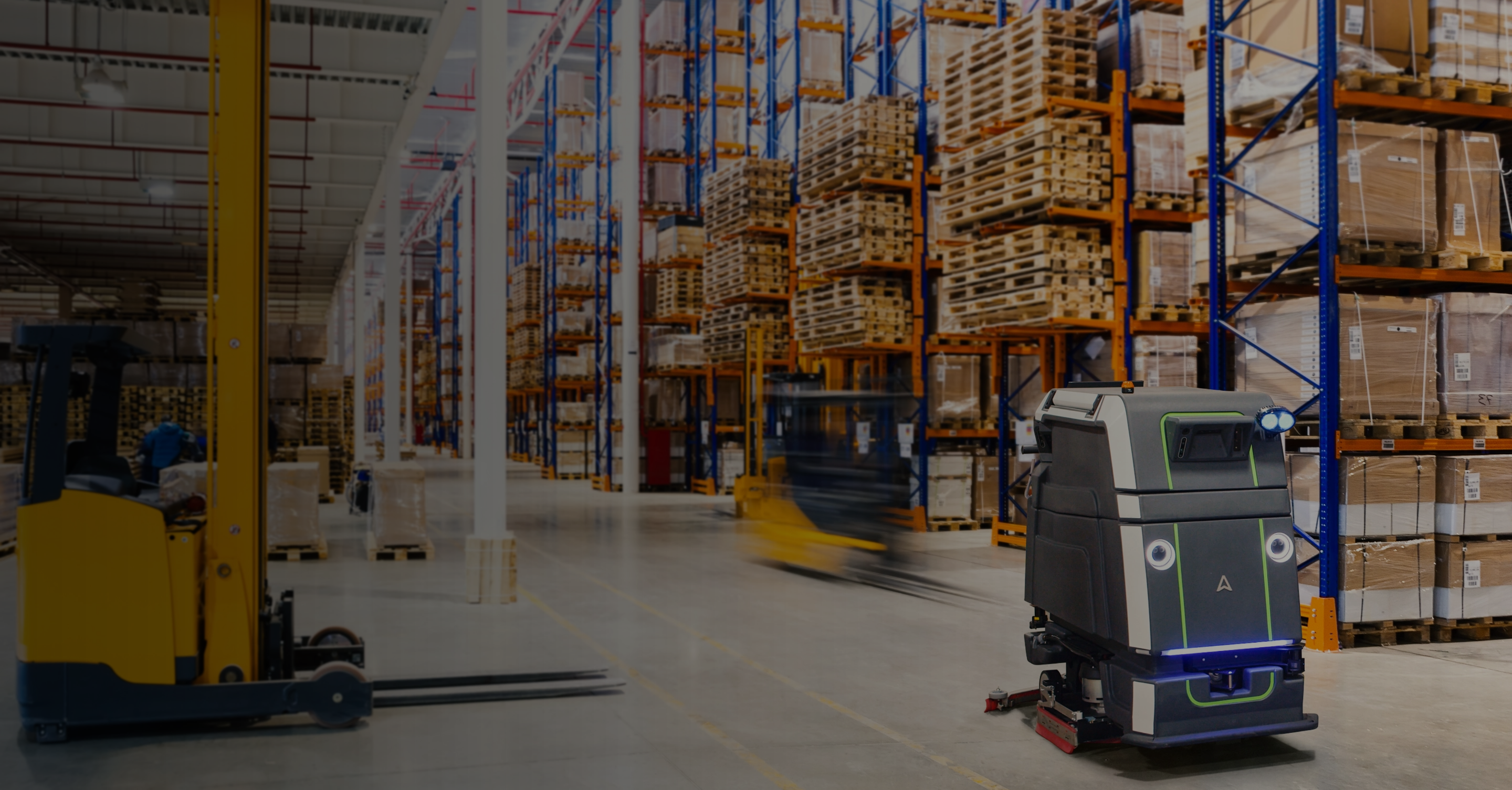 Avidbots Neo 2 robotic scrubber cleaning floor next to warehouse shelves