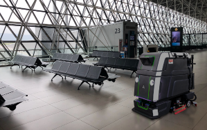 Avidbots robotic scrubber cleaning airport floor