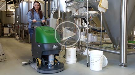 still shot from video of bulldog scrubber cleaning brewery floors