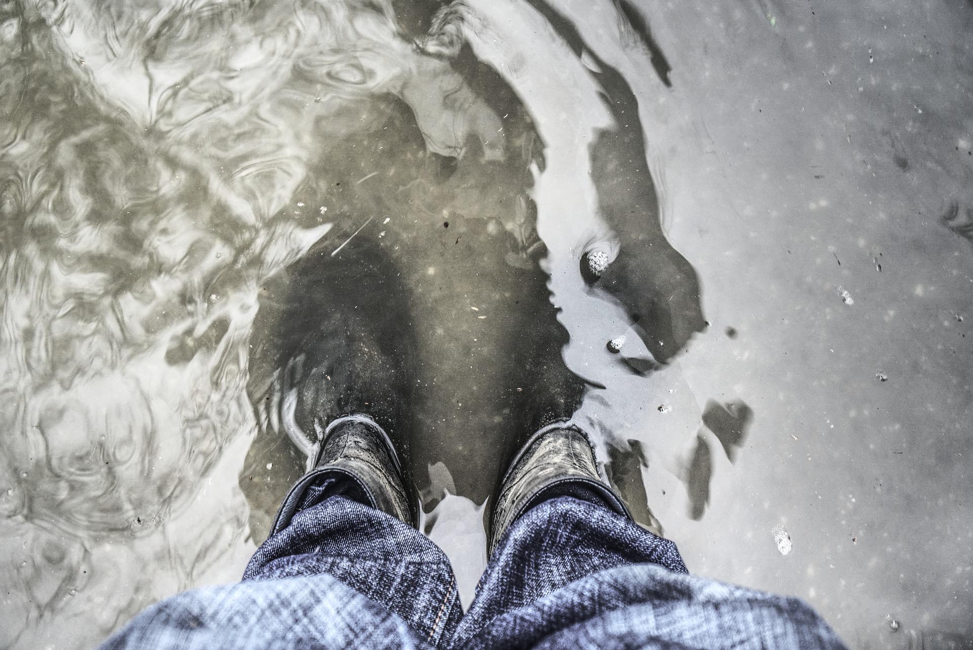 Standing in flooded water