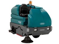 Tennant T12 battery powered ride on floor scrubber sweeper for rent