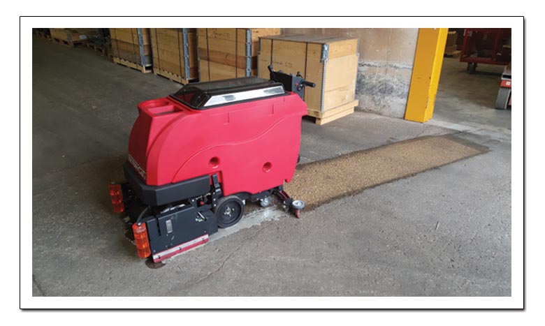 Factory Cat Mini HD Floor Scrubber in Manufacturing Plant