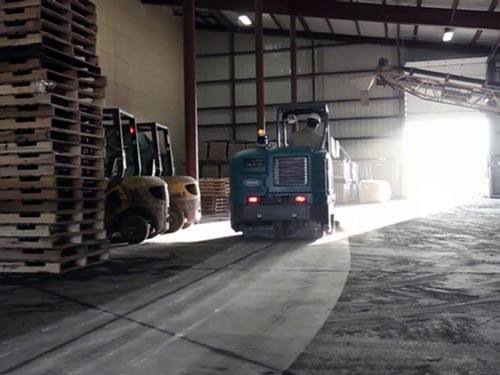 tennant rider scrubber cleaning distribution facility floor