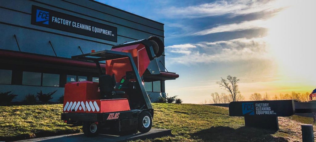 Exterior view of Factory Cleaning Equipment offices in Mooresville North Carolina with PowerBoss Atlas floor sweeper in front of the building