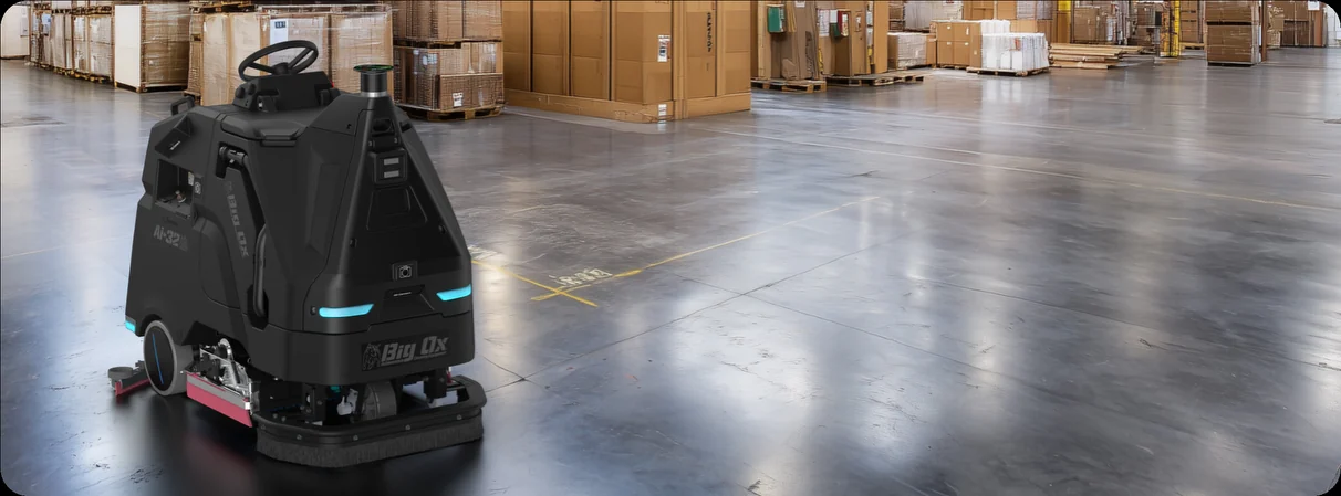 Big Ox Ai-32 Autonomous Scrubber — In a working warehouse
